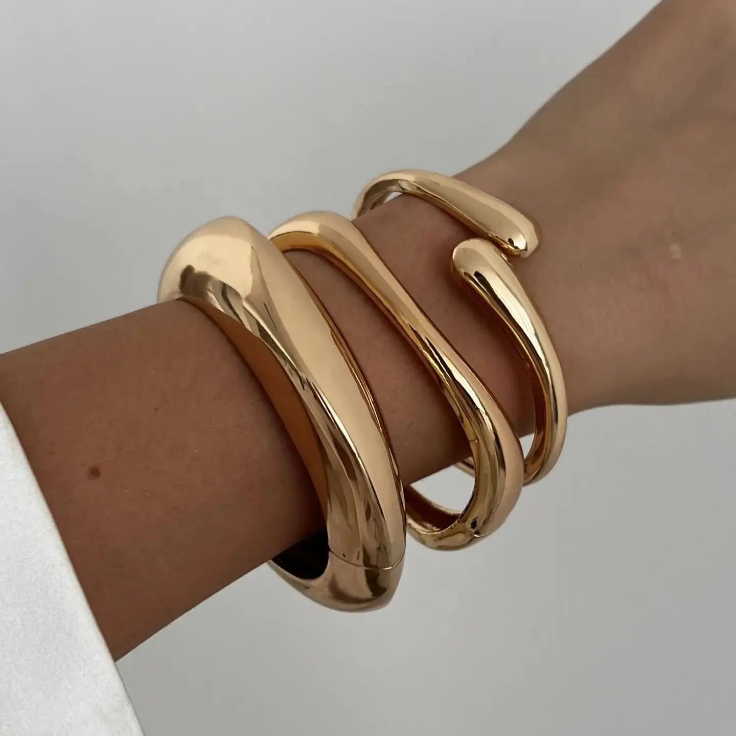 Luna’s Elegant Fluid Cuff Bracelet