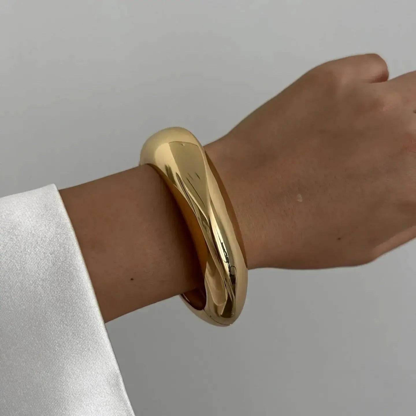 Luna’s Elegant Fluid Cuff Bracelet