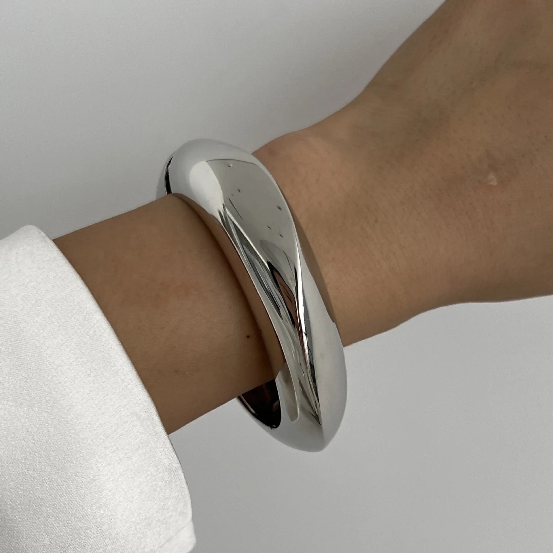 Luna’s Elegant Fluid Cuff Bracelet