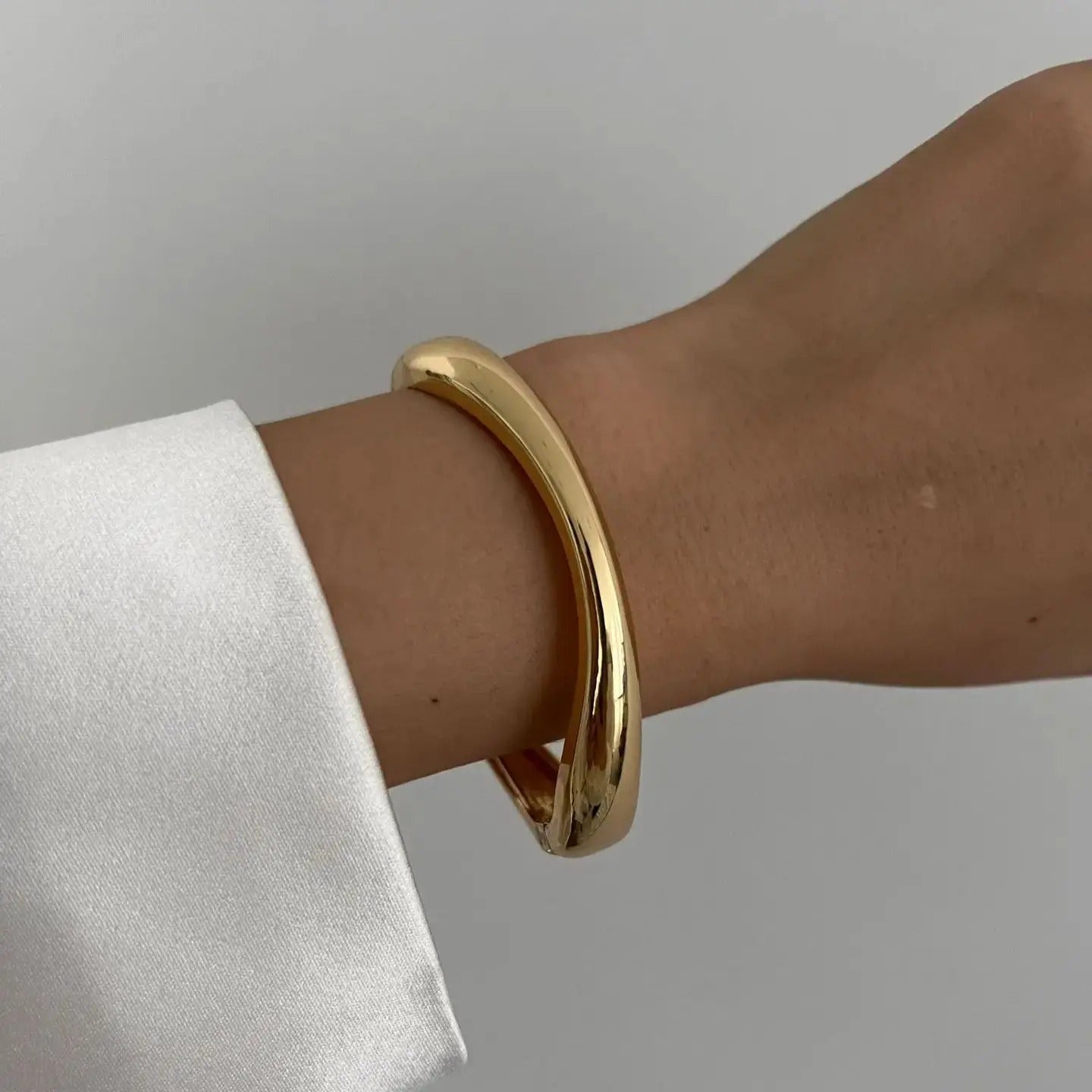 Luna’s Elegant Fluid Cuff Bracelet