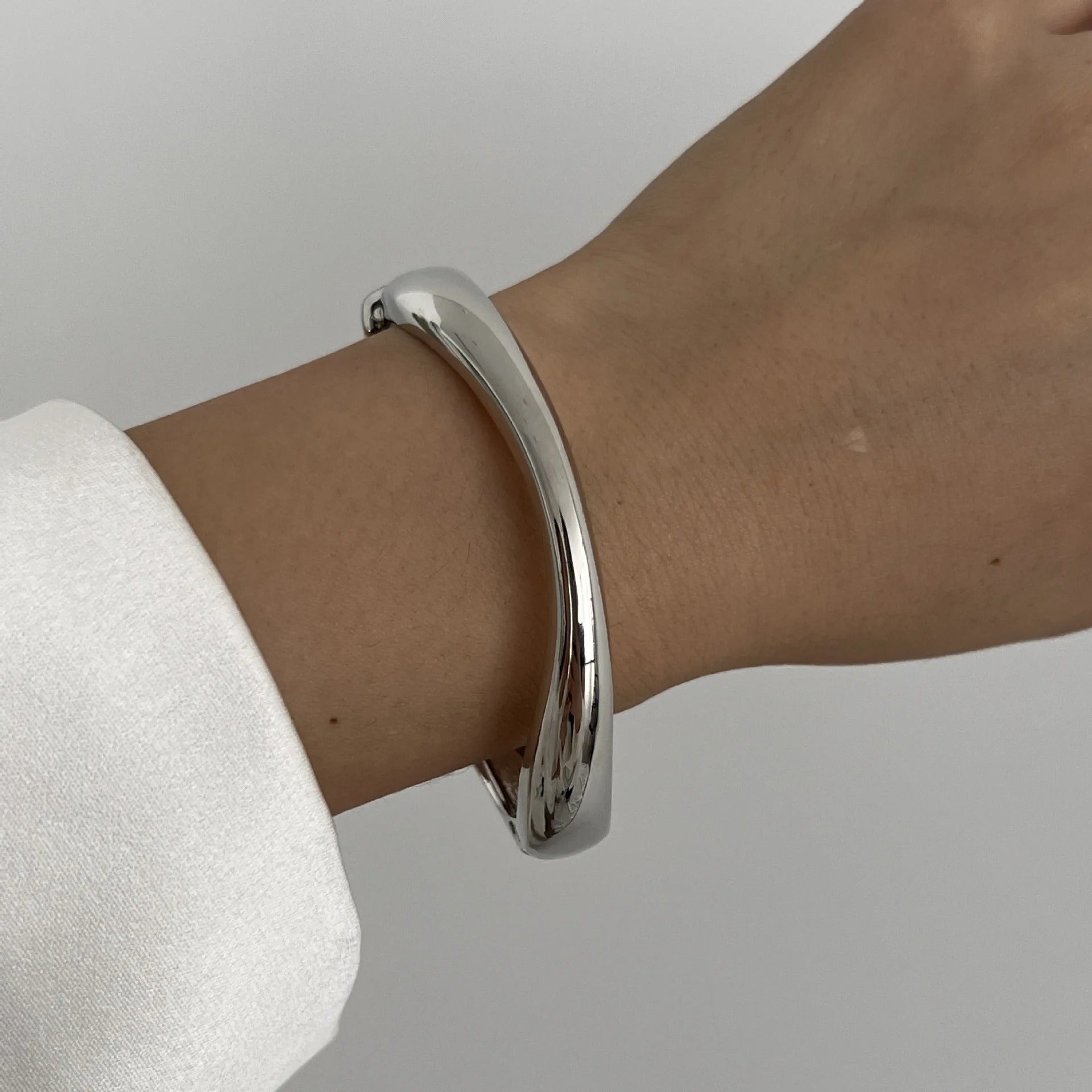 Luna’s Elegant Fluid Cuff Bracelet