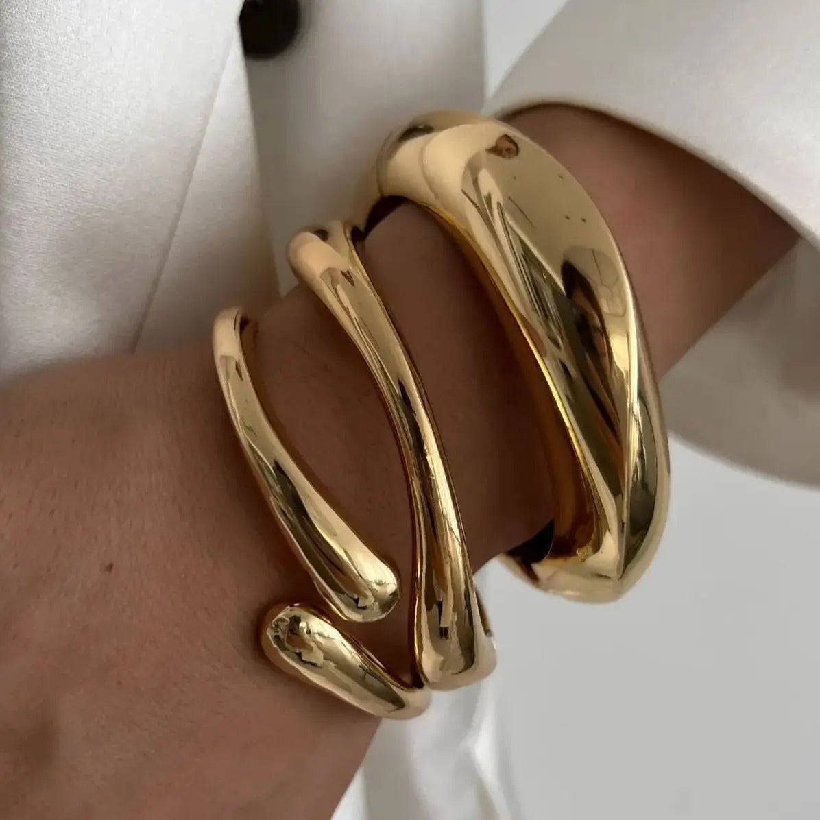 Luna’s Elegant Fluid Cuff Bracelet