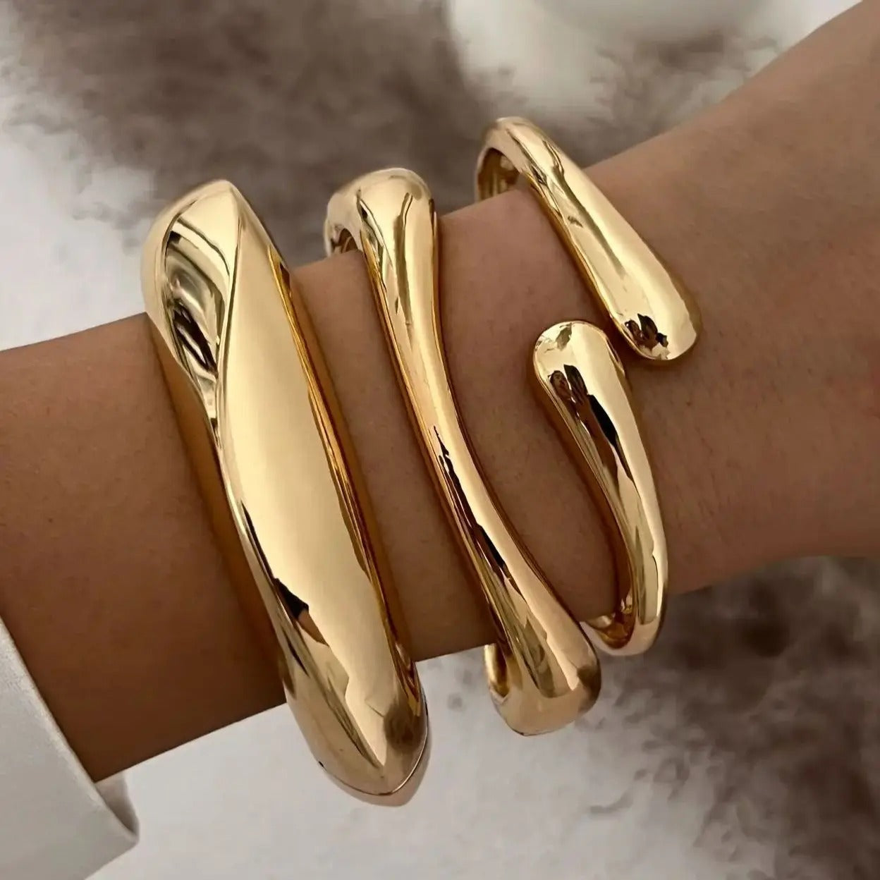 Luna’s Elegant Fluid Cuff Bracelet