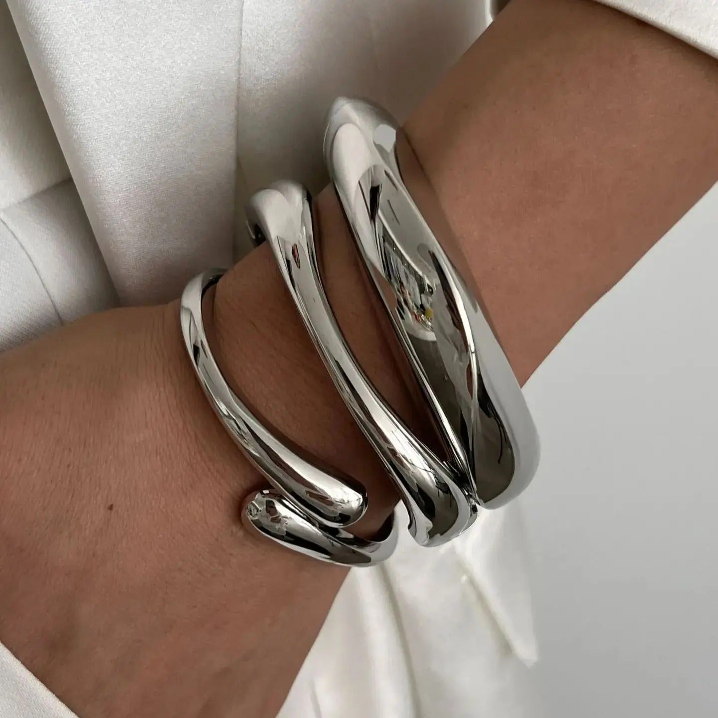 Luna’s Elegant Fluid Cuff Bracelet