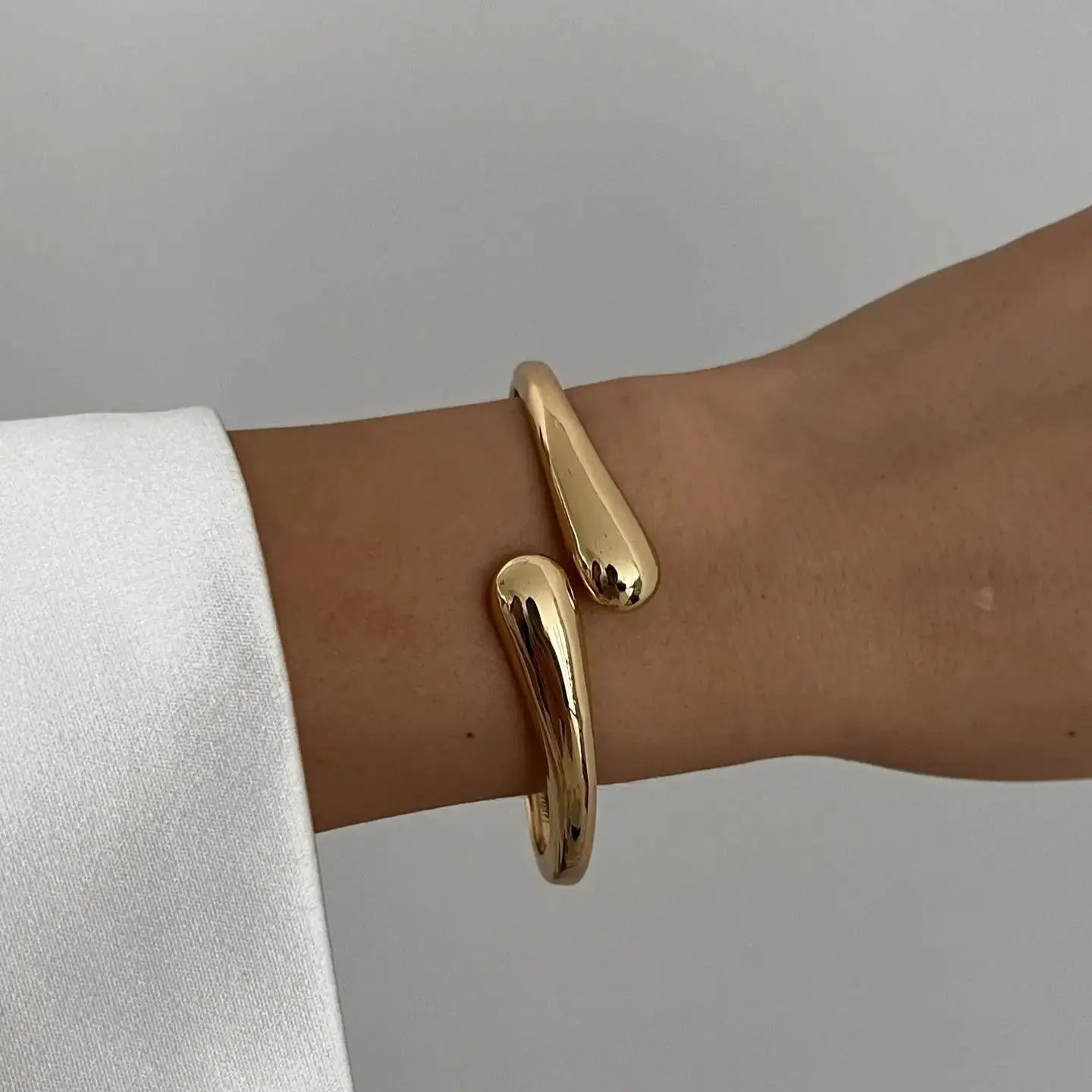 Luna’s Elegant Fluid Cuff Bracelet