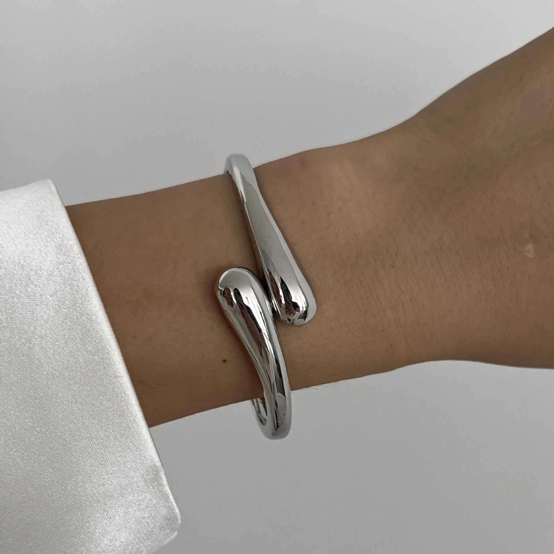 Luna’s Elegant Fluid Cuff Bracelet